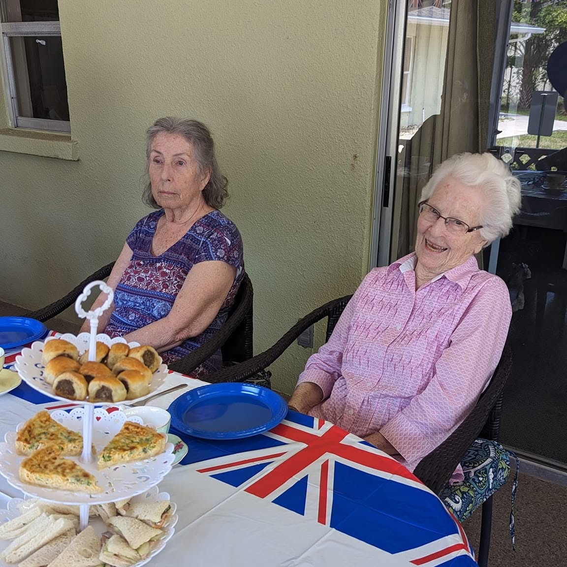 Residents enjoying a British-themed tea party